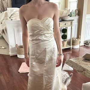 Creamy satin strapless gown with corset straps on back